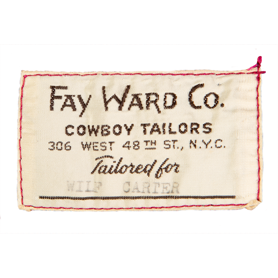 The Fay Ward label shown with the Kay Arnold ensemble.